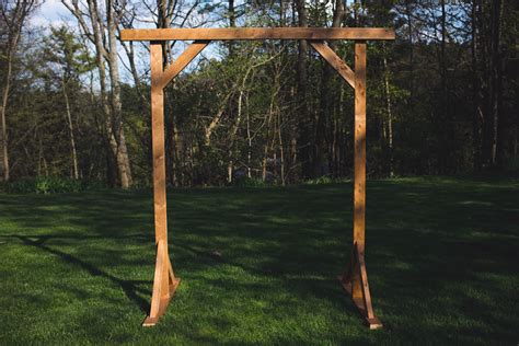 Enhance the Romance: Discover the stunning Dimensions of our Wooden Wedding Arbor!